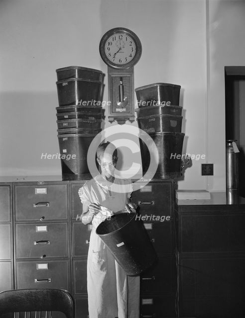 Government charwoman who provides for a family of six on her salary..., Washington, D.C., 1942. Creator: Gordon Parks.