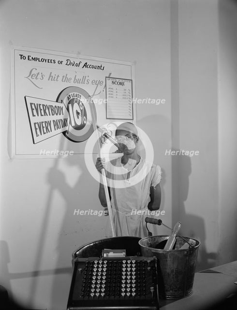 Government charwoman who provides for a family of six on her salary..., Washington, D.C., 1942. Creator: Gordon Parks.