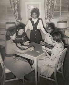 Government hotel for Negro women war workers; A group of young war worker..., 1942-1943. Creator: Roger Smith