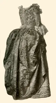 Gown of yellow damask brocade worn over a blue quilted satin petticoat, c1710-1730, (1937). Creator: Unknown