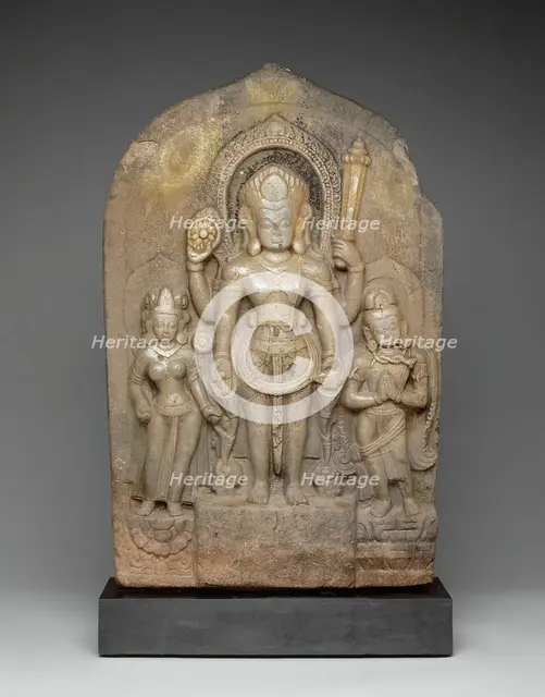 God Vishnu with Goddess Lakshmi and His Mount, Garuda, in Attendance, 11th century. Creator: Unknown.
