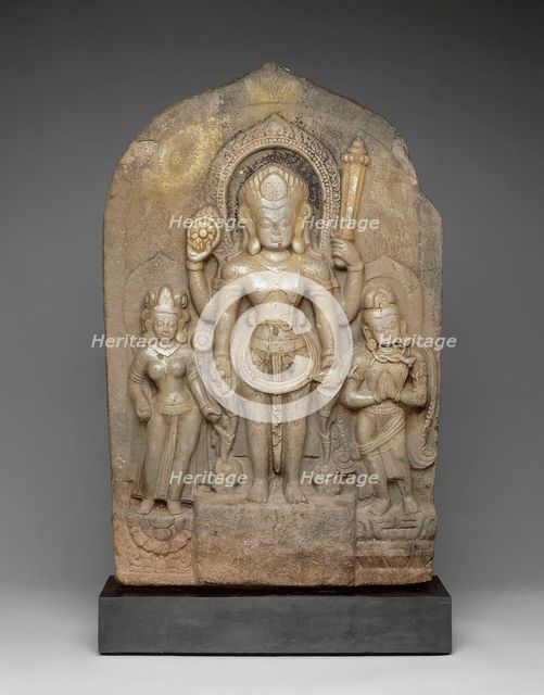 God Vishnu with Goddess Lakshmi and His Mount, Garuda, in Attendance, 11th century. Creator: Unknown.