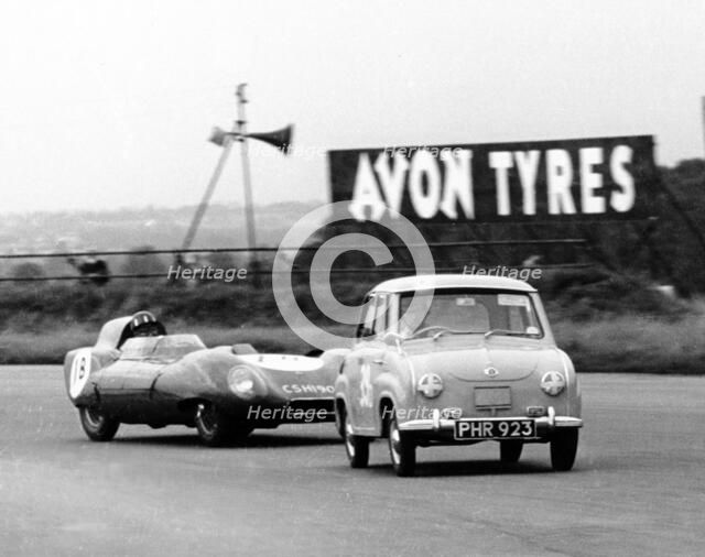 Goggomobil microcar competing in a 6 hour relay race at Silverstone, Northamptonshire, 1957. Creator: Unknown.