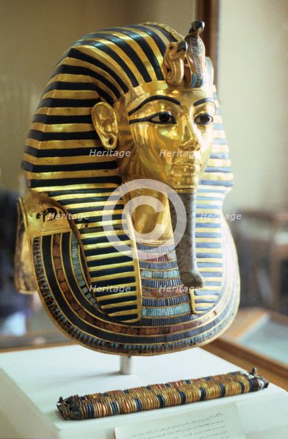 Gold and lapis lazuli funerary mask of Tutankhamun, King of Egypt, c1323 BC. Artist: Unknown