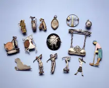 Gold and silver jewellery with a golfing theme, 1910-1938. Creator: Unknown
