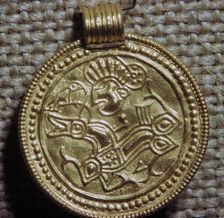 Gold bracteate depicting a horse and bird, 5th century