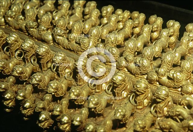 Gold chest late with zoomorphic round shaped, detail.