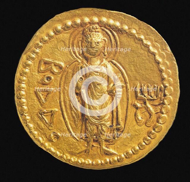 Gold Coin, Kushan. Reverse: in Bactrian script Buddha (boddo), 127-150. Creator: Numismatic, Ancient Coins  .