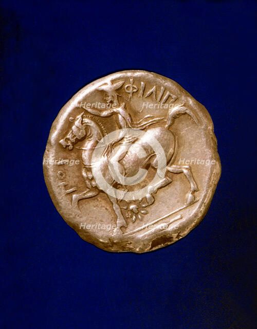 Gold coin with Philip II (382-336 a.C.), king of Macedonia.