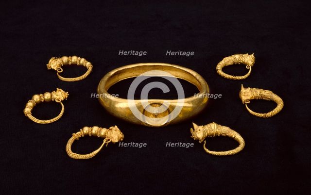 Gold earrings and gold armlet, fom a temple treasure, 4th-3rd century BC. Artist: Unknown.