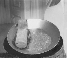 Gold in pan, 1916. Creator: Unknown