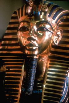 Gold mask of Tutankhamun on his mummy-case