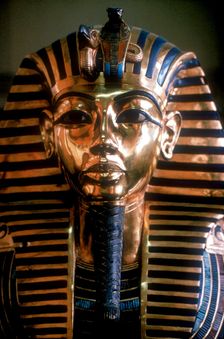Gold mask of Tutankhamun on his mummy-case