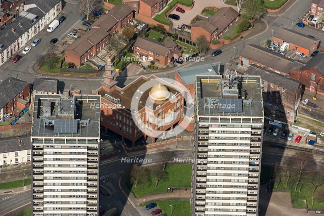 Golden Mosque overshadowed by two of the Seven Sisters towers, Rochdale, 2019. Creator: Historic England.