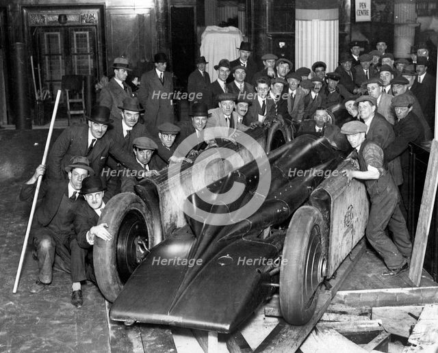 Golden Arrow with crowd of people after unpacking from crate 1929. Creator: Unknown.