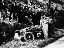 Goldie Gardner by the wreckage of an MG J4, 1932
