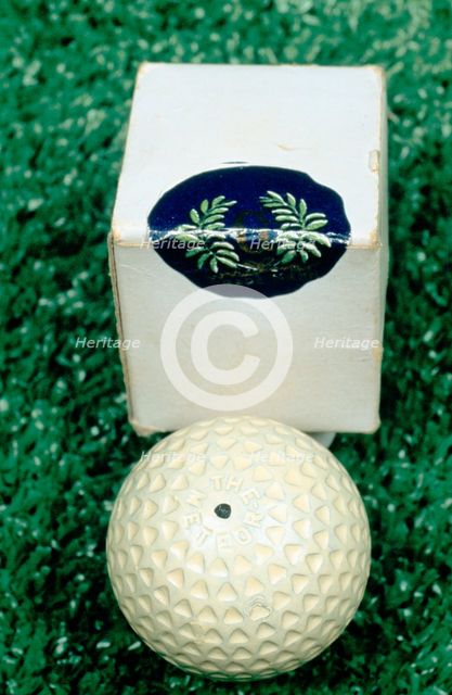 Golf ball and box, c1910. Creator: Unknown.