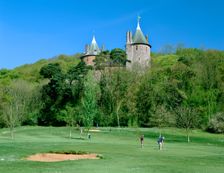 Golf course and Castell Coch, Tongwynlais, near Cardiff, Wales. Creator: Peter Thompson