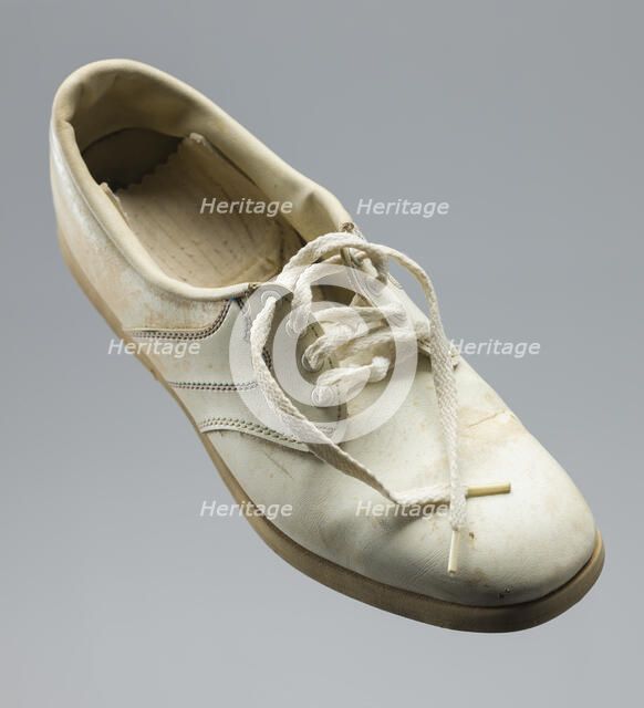 Golf shoe belonging to Ethel Funches, late 20th century. Creator: FootJoy.