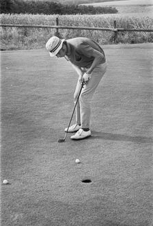 Golfer putting, Sweden, 1969. Creator: Unknown