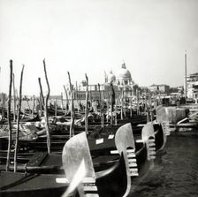 Gondolas moored by the Doge's Palace, Venice, Italy, c1955. Creator: Arthur Charles Kirby Ware