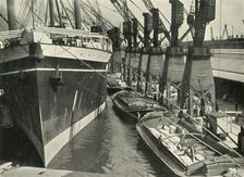 "Goods of Whatever Sort Find Here the Appropriate Facilities for Unloading, Storage and..., 1937. Creator: J Dixon-Scott