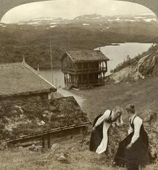 Gossip at a wayside inn at Botten, overlooking the Voxli Lake - view toward Haukeli Mts., Norway Creator: Unknown