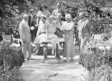Gossler, Philip, Mrs., group, outdoors, not before 1929. Creator: Arnold Genthe