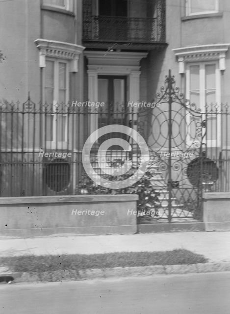 Gate and doorway of a multi-story house, [The James Simmons House, 37 Meeting Street]..., c1920-1926 Creator: Arnold Genthe.
