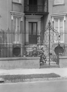 Gate and doorway of a multi-story house, [The James Simmons House, 37 Meeting Street]..., c1920-1926 Creator: Arnold Genthe