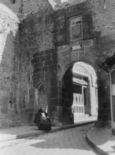 Gateway and entrance to the only street of Mont St Michel, Normandy, France, 20th century