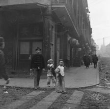 Gambling hall, Jackson Street corner, Chinatown, San Francisco, between 1896 and 1906. Creator: Arnold Genthe