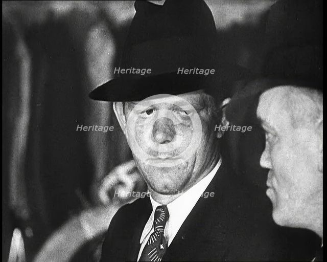 Gangsters demanding protection money, 1932.  Creator: British Pathe Ltd.