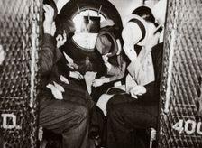 Gangsters in a patrol wagon, New York, USA, mid 1930s. Creator: Unknown