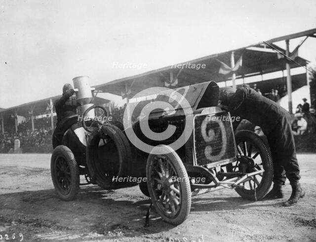 Garcet refuelling his Mors, Coppa Florio, Bologna, Italy, 1908. Artist: Unknown