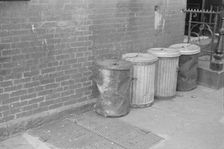 Garbage cans, 61st Street between 1st and 3rd Avenues, New York, 1938. Creator: Walker Evans