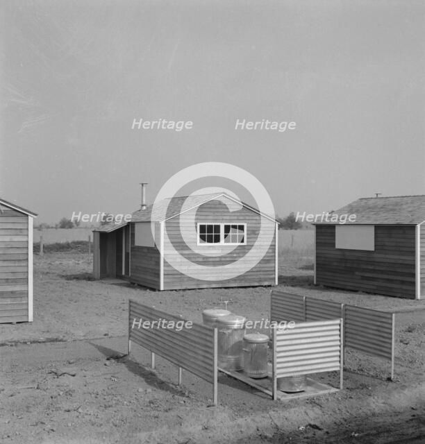 Garbage disposal in new Yamhill farm family labor camp, near McMinnville, Oregon, 1939. Creator: Dorothea Lange.