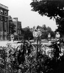 Garden and part of the east front, Hampton Court Palace, Richmond upon Thames, London. Creator: The Fine Art Photographers Co