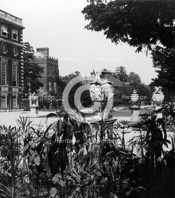 Garden and part of the east front, Hampton Court Palace, Richmond upon Thames, London. Creator: The Fine Art Photographers Co.