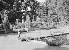 Garden, East Hampton, Long Island, between 1933 and 1942. Creator: Arnold Genthe