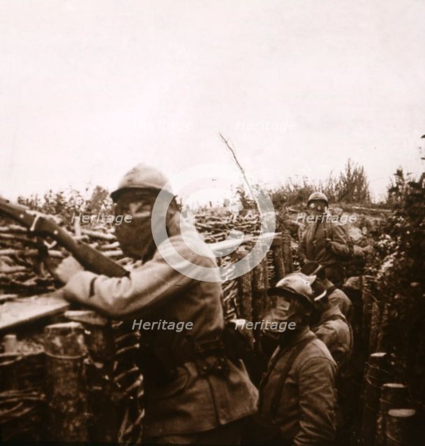 Gas alert in trenches, Champagne, northern France, 1916. Artist: Unknown.
