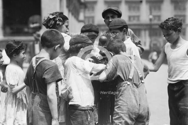 Getting drinks on hot day, between c1910 and c1915. Creator: Bain News Service.