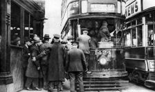 Getting on to a tram at Blackfriars, London, 1926-1927