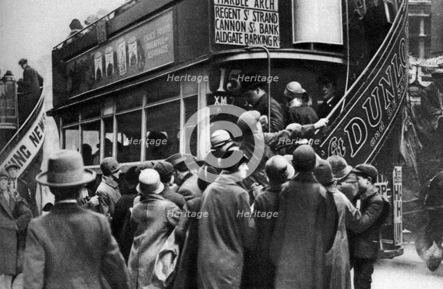 Getting on a bus in Ludgate Hill, London, 1926-1927. Artist: Unknown
