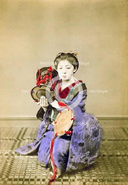 Geisha playing the tsuzumi, Japan, 1882. Artist: Felice Beato