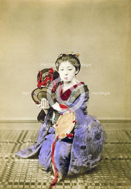 Geisha playing the tsuzumi, Japan, 1882. Artist: Felice Beato