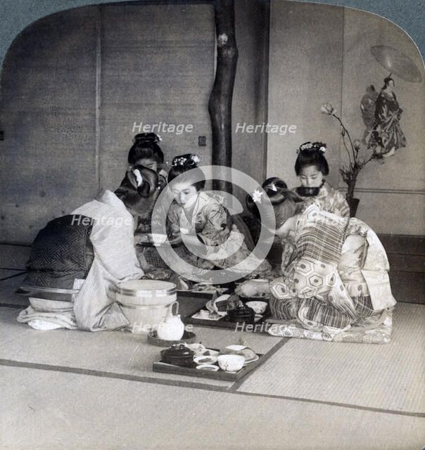 Geishas at dinner, Tokyo, Japan, 1904. Artist: Underwood & Underwood