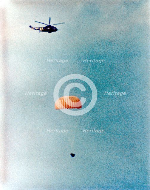 Gemini 12 descends for splashdown, 1966. Creator: NASA.