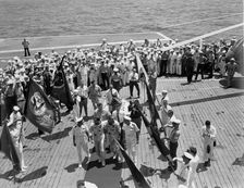Gemini IV crew arrives on the USS Wasp, June 7, 1965. Creator: NASA