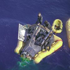 Gemini VIII splashdown, Armstrong and Scott with hatches open, March 16, 1966. Creator: NASA